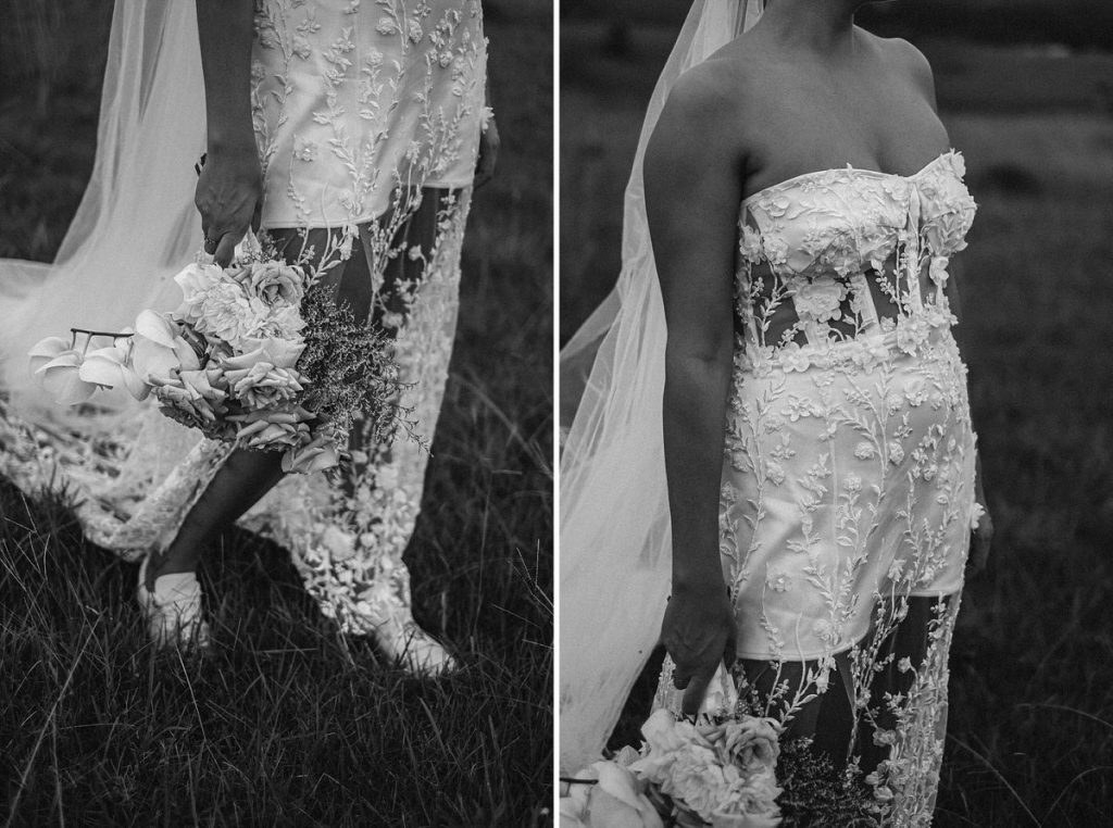 Byron Bay wedding photographer, bride showing off details of her Details of Christie Nicole Bridal gown with white runners